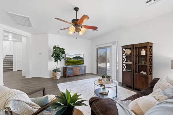 a kitchen with a sink stove and refrigerator