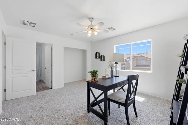 a bathroom with a double vanity sink and mirror
