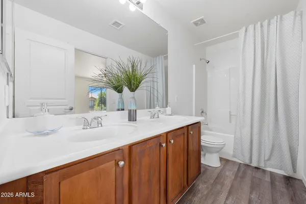 a swimming pool with outdoor seating and yard