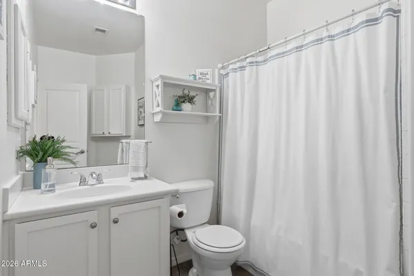 a view of a balcony with an ocean view
