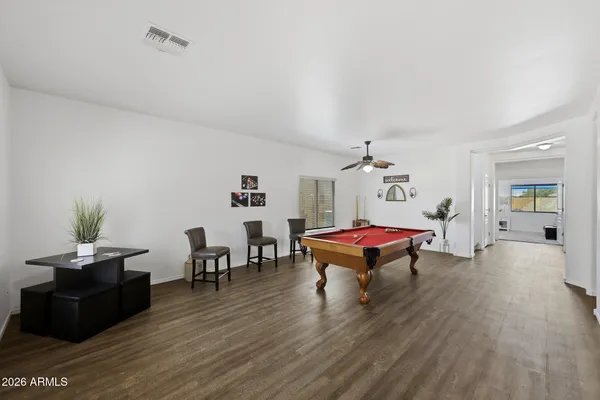 a kitchen with a sink stove and refrigerator