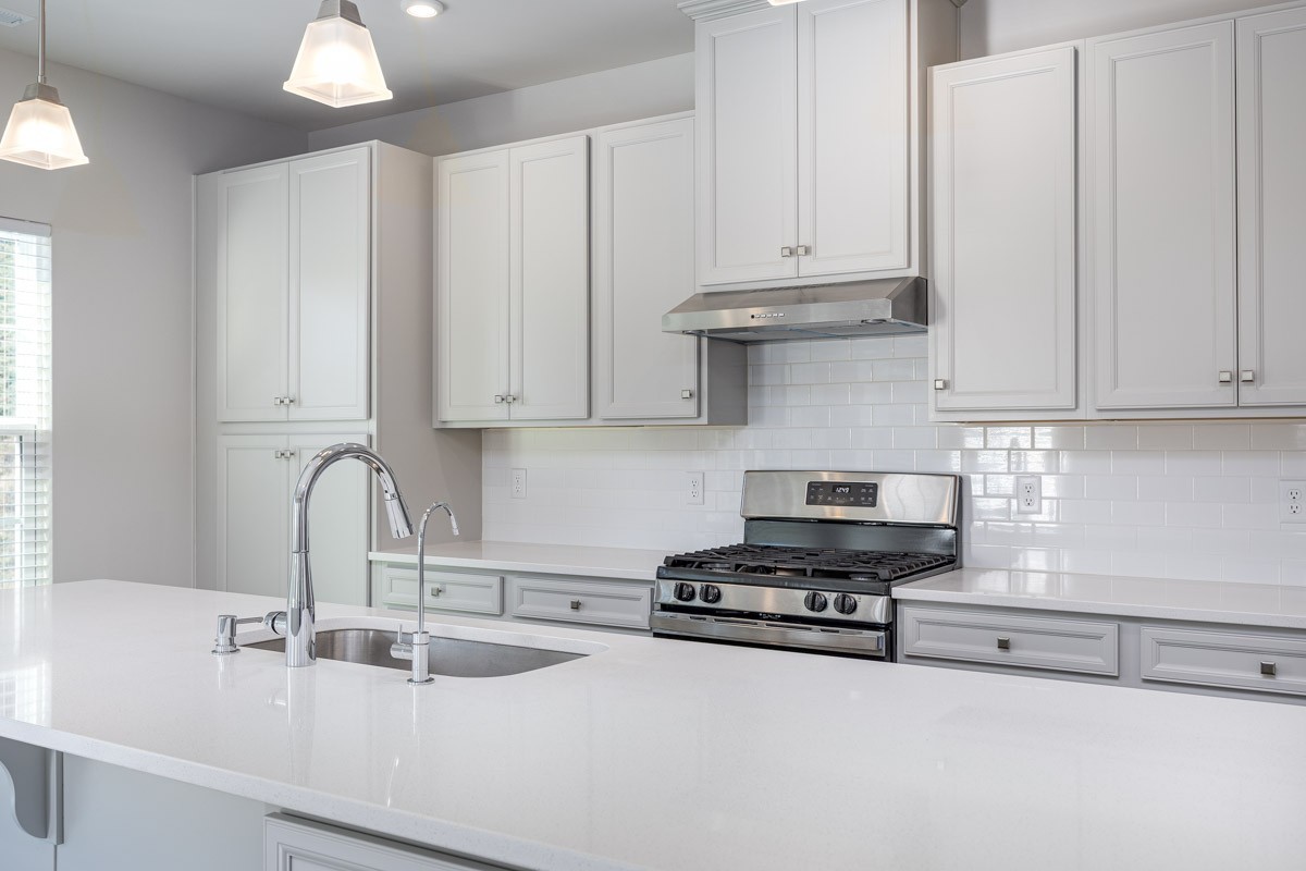 968 Caywood Road Smyrna, TN 37167 - Photo 21 of 54 a kitchen with granite countertop white cabinets and sink
