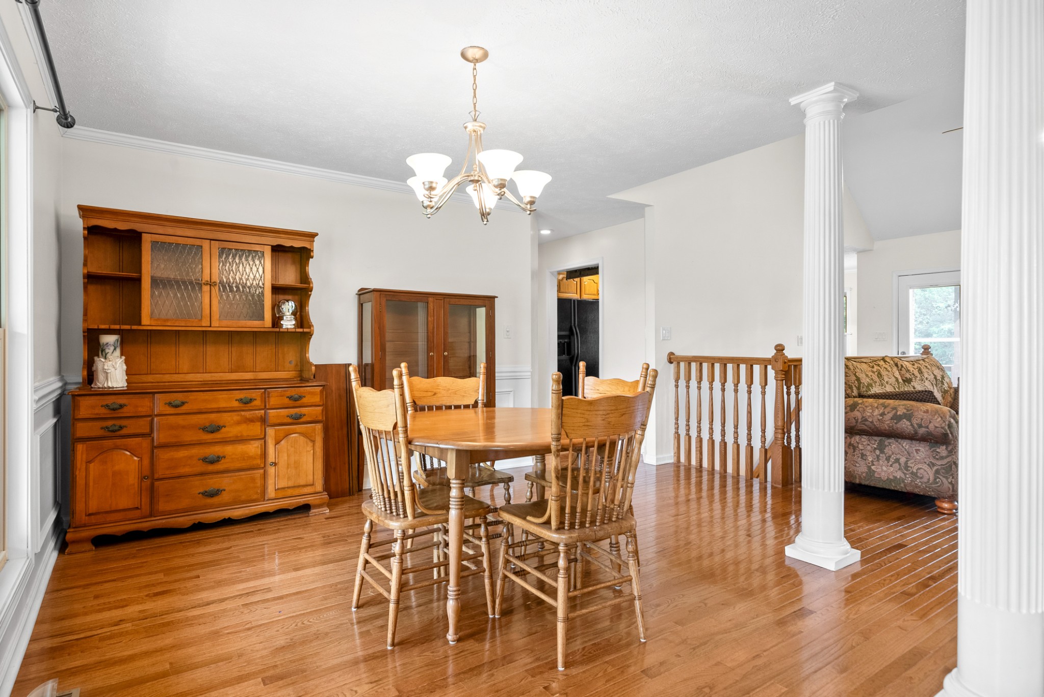 2105 Lock B Road North Clarksville, TN 37043 - Photo 12 of 30 a view of a dining room with furniture wooden floor and chandelier