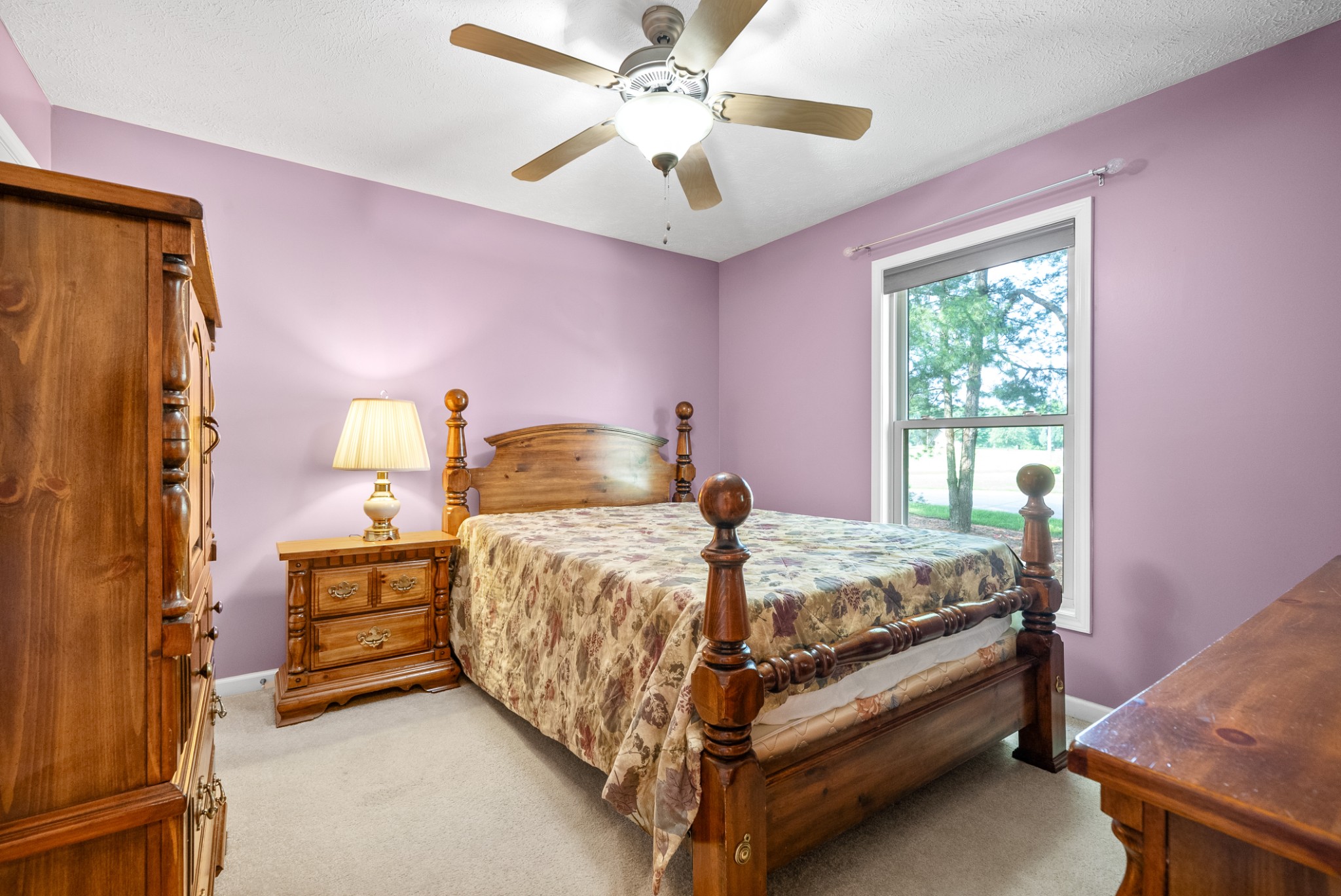 2105 Lock B Road North Clarksville, TN 37043 - Photo 23 of 30 a bedroom with a bed and a chandelier fan