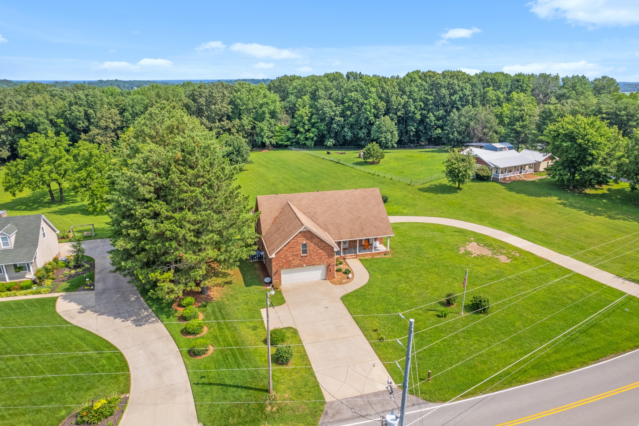 2105 Lock B Road North Clarksville, TN 37043 - Photo 3 of 30 an aerial view of a house with a garden and trees