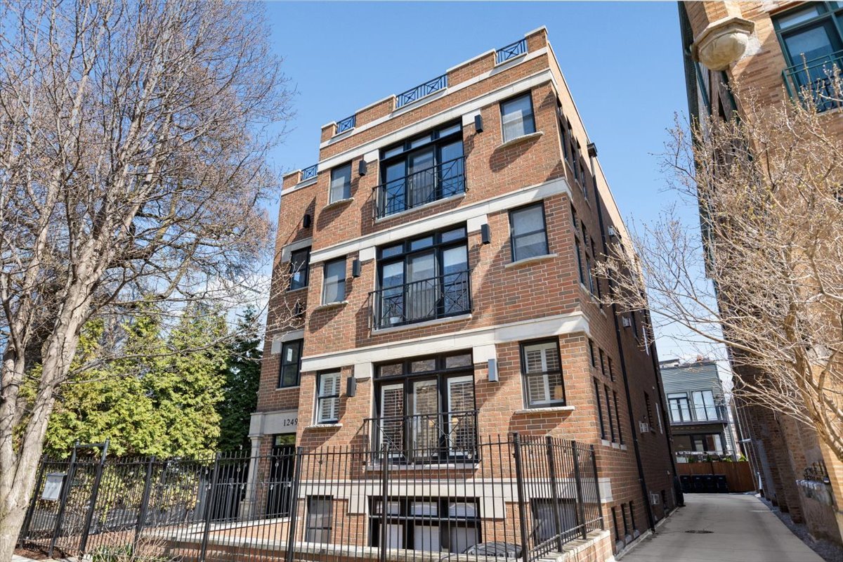 1249 North Wolcott Avenue, Unit 2 Chicago, IL 60622 - Photo 1 of 26 front view of a building