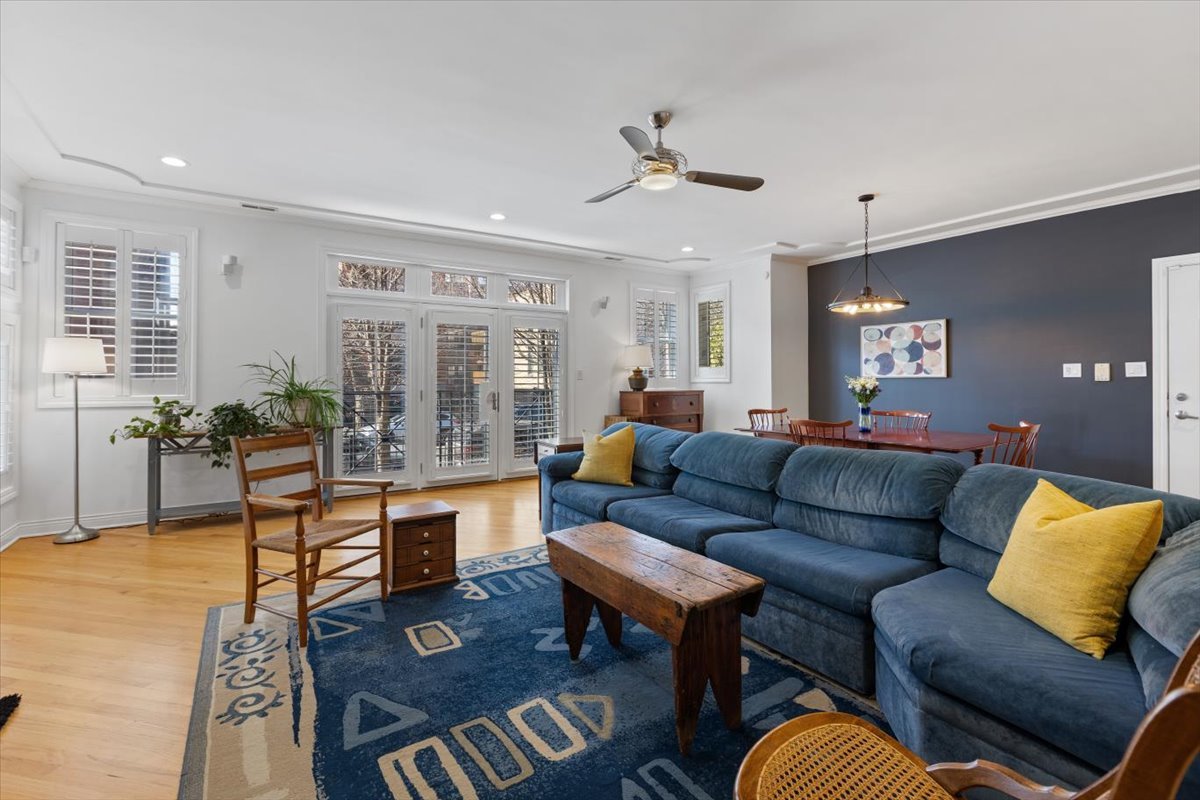 1249 North Wolcott Avenue, Unit 2 Chicago, IL 60622 - Photo 5 of 26 a living room with furniture kitchen view and a window