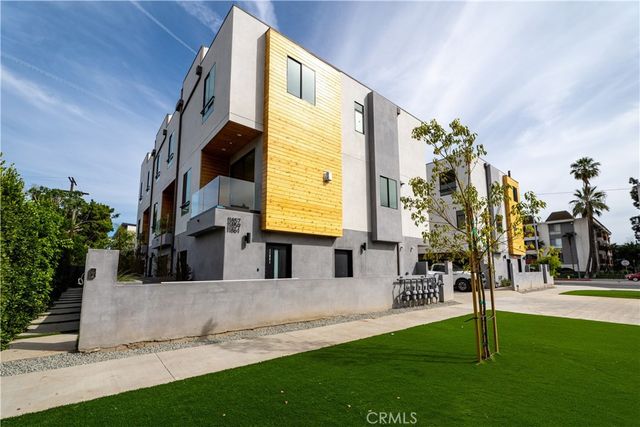 a view of a street with buildings