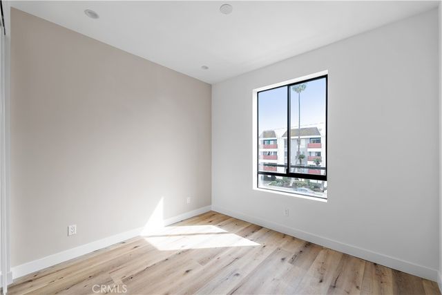 a view of a house with brick walls