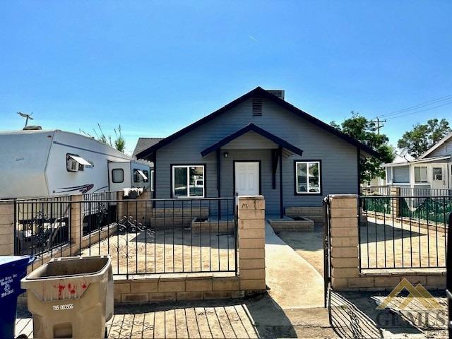 Undisclosed Address Bakersfield, CA 93308 - Photo 1 of 15 a view of a house with wooden deck