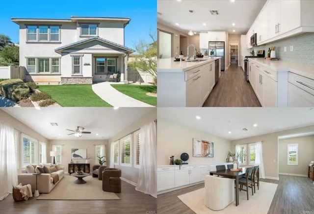 a living room with lots of furniture and kitchen view