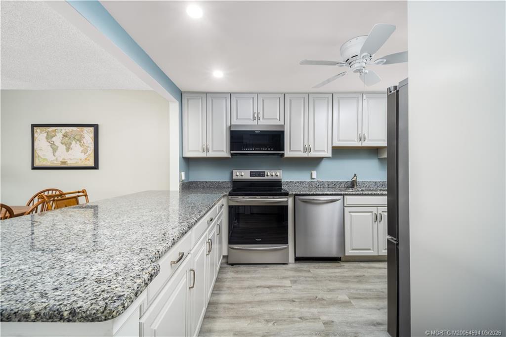 3100 Southeast Pruitt Road, Unit E203 Port St. Lucie, FL 34952 - Photo 11 of 36 Pull out drawers and soft close cabinets