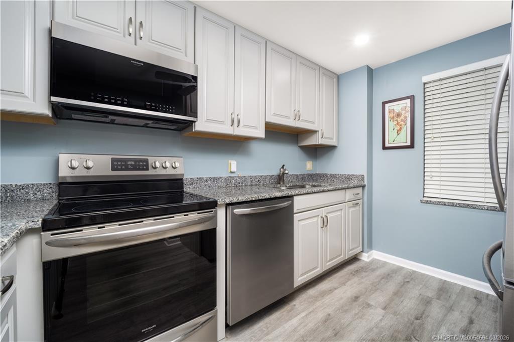 3100 Southeast Pruitt Road, Unit E203 Port St. Lucie, FL 34952 - Photo 12 of 36 Updated appliances