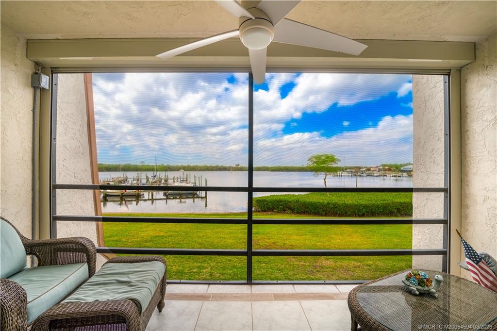 3100 Southeast Pruitt Road, Unit E203 Port St. Lucie, FL 34952 - Photo 15 of 36 Screened. Tiled. Sunset exposure