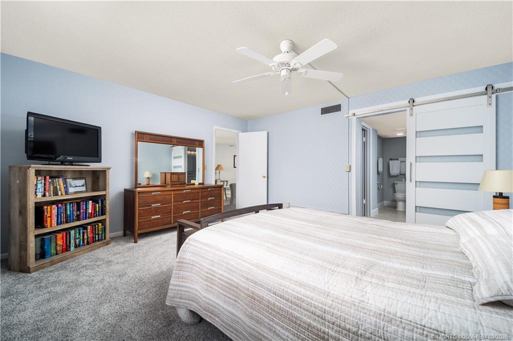 3100 Southeast Pruitt Road, Unit E203 Port St. Lucie, FL 34952 - Photo 18 of 36 Stable door separates bath area