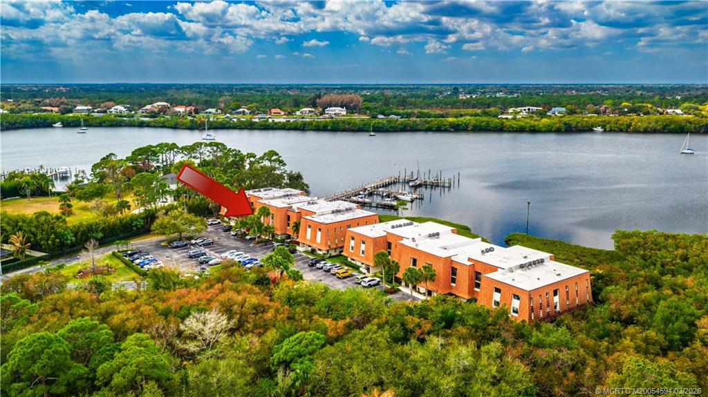 3100 Southeast Pruitt Road, Unit E203 Port St. Lucie, FL 34952 - Photo 2 of 36 Wide water views of Kitching Cove 24/7