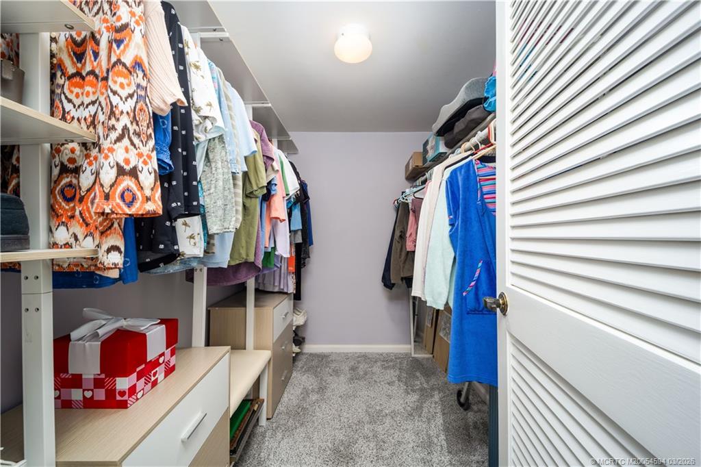 3100 Southeast Pruitt Road, Unit E203 Port St. Lucie, FL 34952 - Photo 22 of 36 Deep walk in closet
