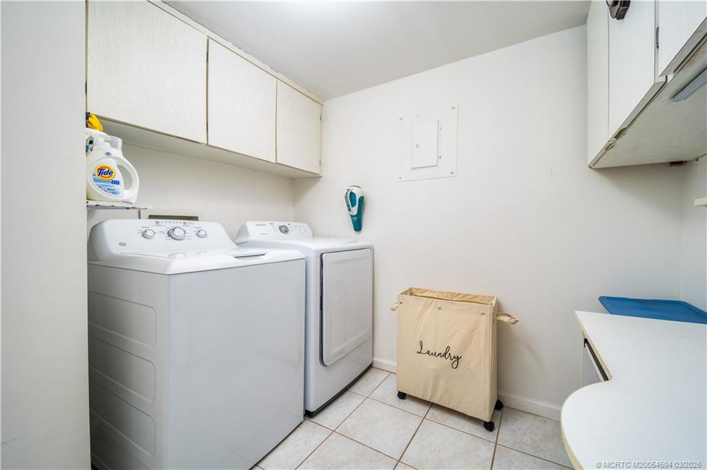 3100 Southeast Pruitt Road, Unit E203 Port St. Lucie, FL 34952 - Photo 25 of 36 Full size appliances and storage