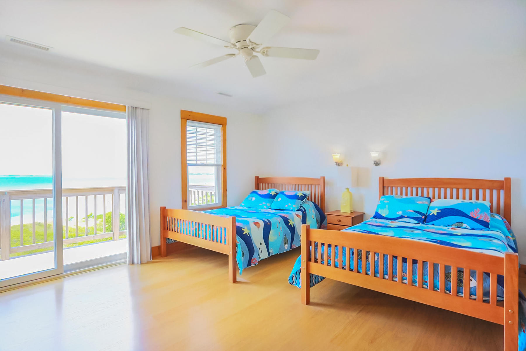 3 Marys Way Truro, MA 02666 - Photo 16 of 37 a bedroom with two beds and a window