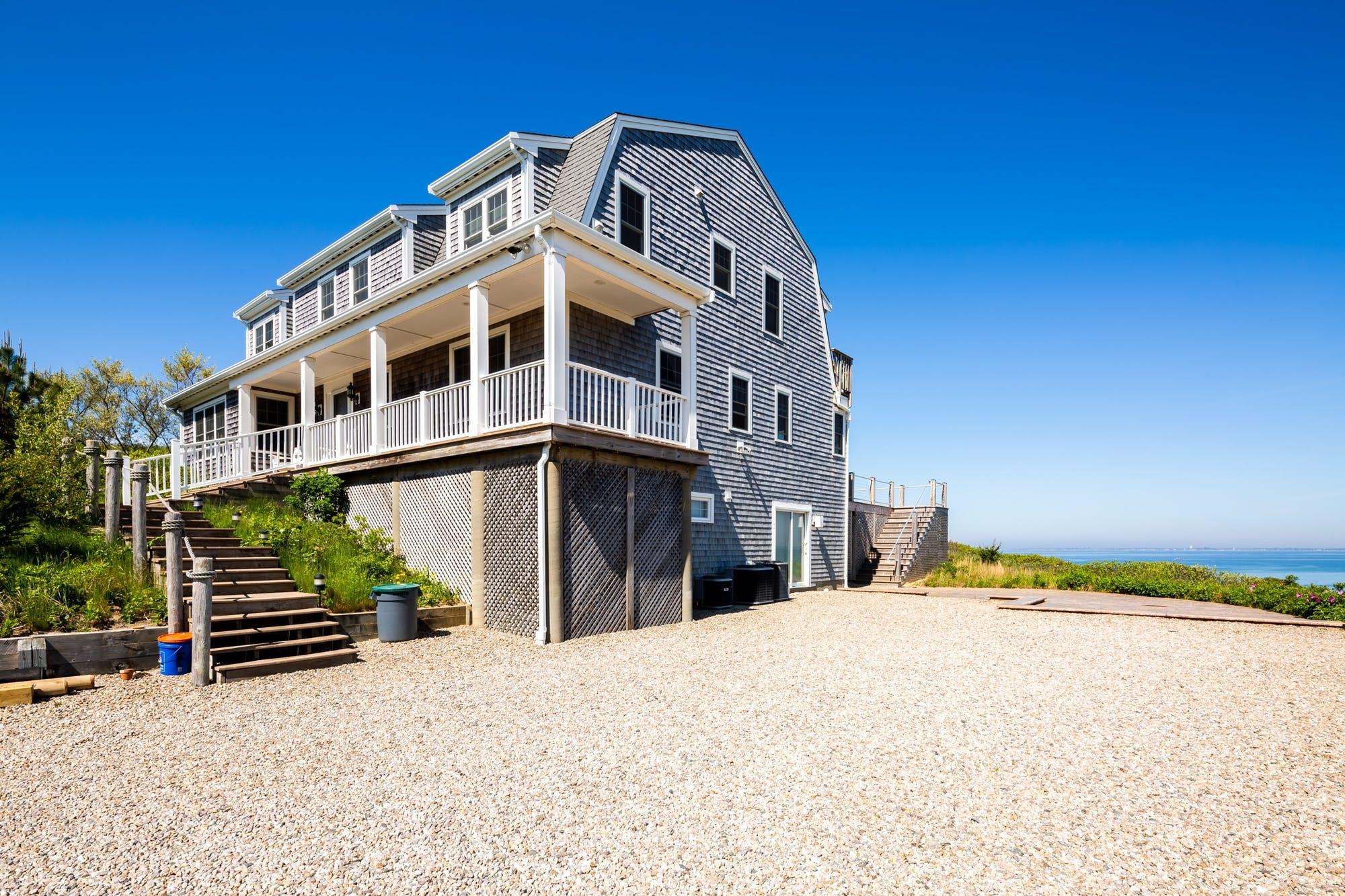 3 Marys Way Truro, MA 02666 - Photo 5 of 37 a view of a building with wooden fence