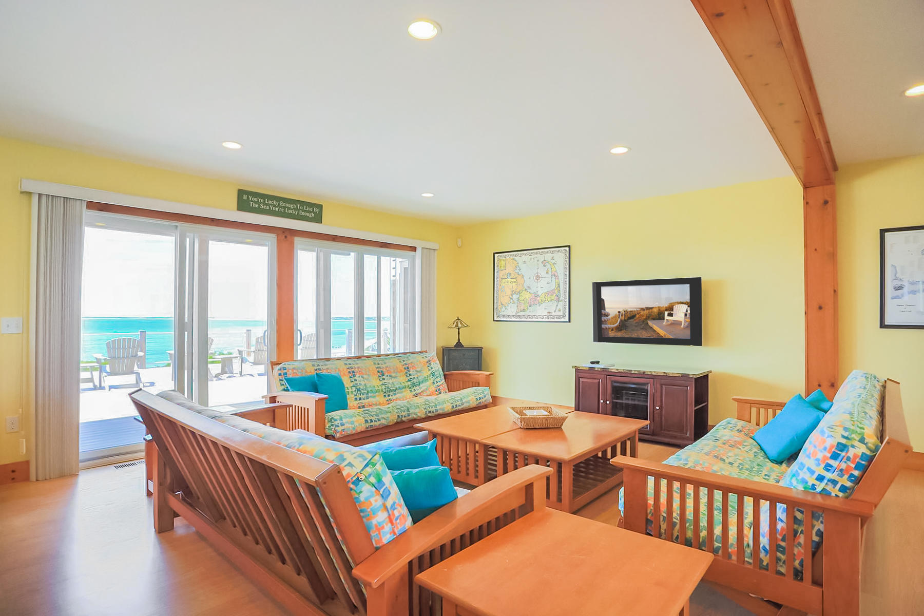 3 Marys Way Truro, MA 02666 - Photo 9 of 37 a living room with furniture and a large window