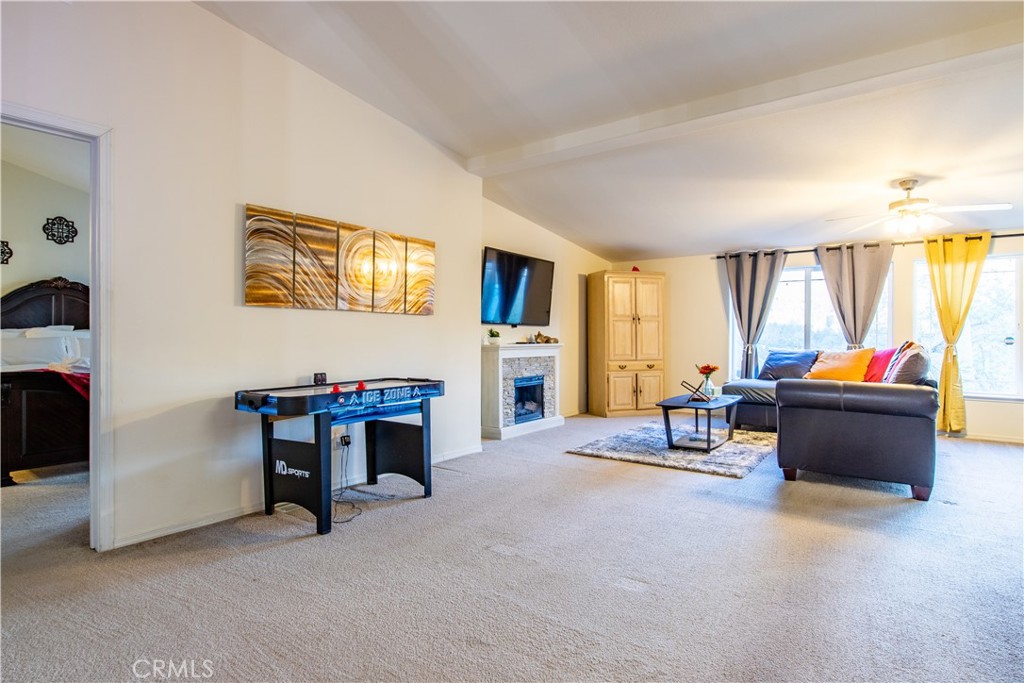 5038 Oak Road Midpines, CA 95345 - Photo 11 of 53 a living room with furniture and a window