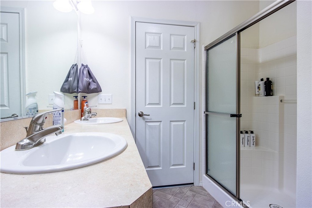 5038 Oak Road Midpines, CA 95345 - Photo 21 of 53 a bathroom with a sink and a mirror