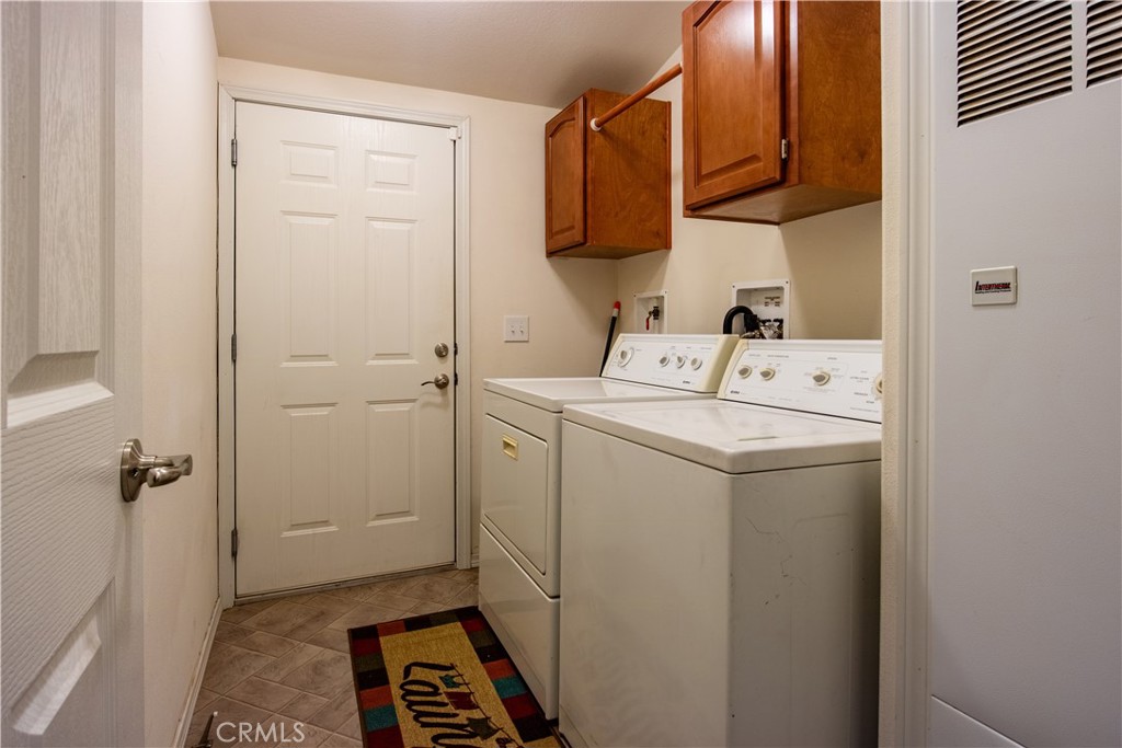 5038 Oak Road Midpines, CA 95345 - Photo 31 of 53 a utility room with dryer and washer