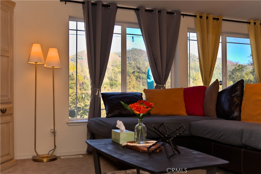 5038 Oak Road Midpines, CA 95345 - Photo 5 of 53 a living room with furniture and a window