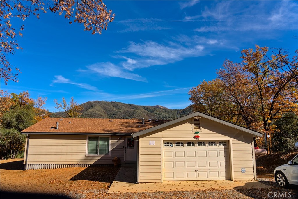 5038 Oak Road Midpines, CA 95345 - Photo 8 of 53 a front view of a house with a yard