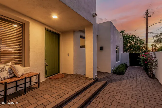a view of a house with a yard and garage