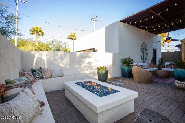a view of swimming pool with outdoor seating