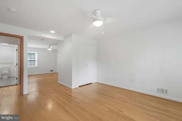 a view of a livingroom with wooden floor