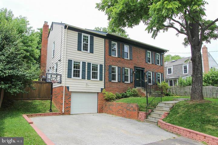 9102 Jones Mill Road Chevy Chase, MD 20815 - Photo 2 of 32 front view of a house with a yard