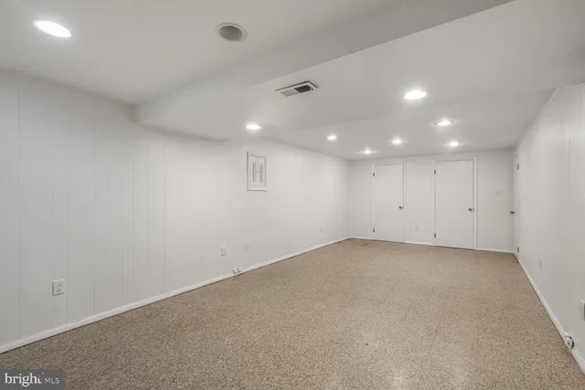 an empty room with an entryway