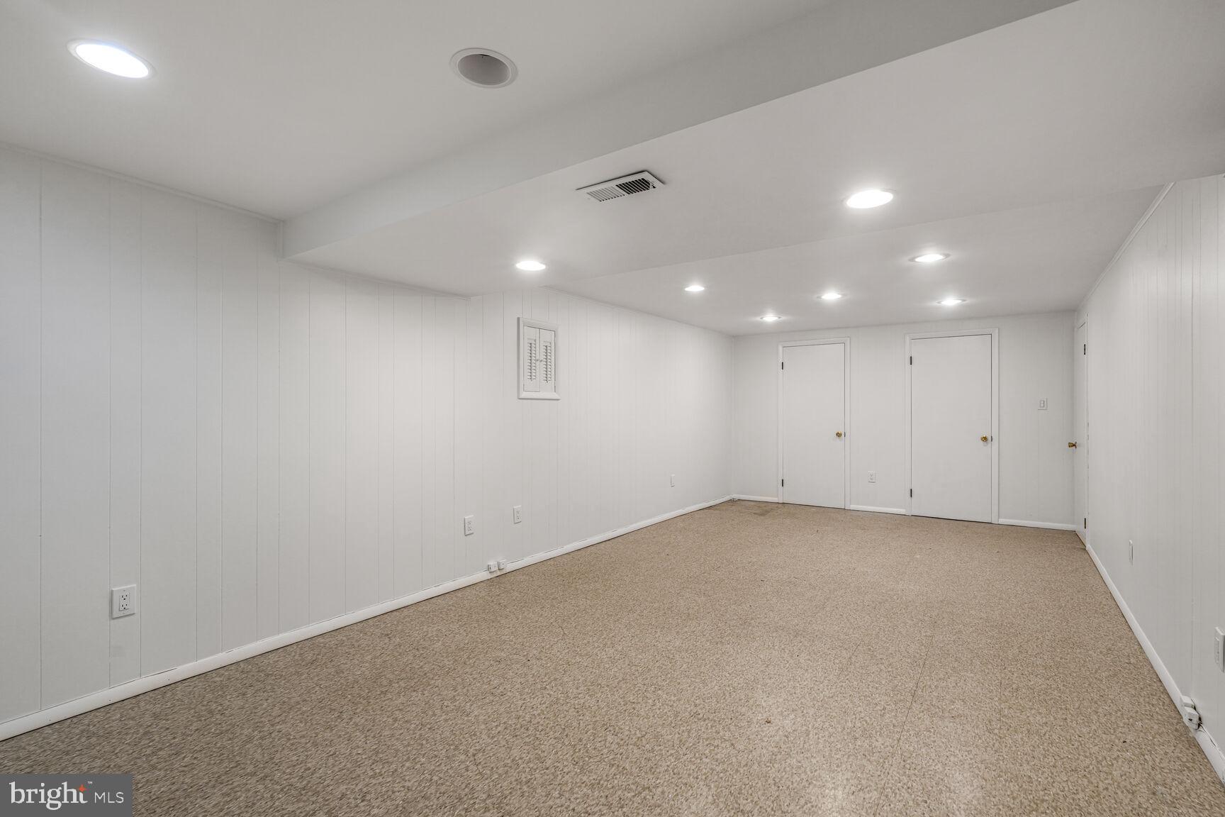 9102 Jones Mill Road Chevy Chase, MD 20815 - Photo 22 of 32 an empty room with an entryway