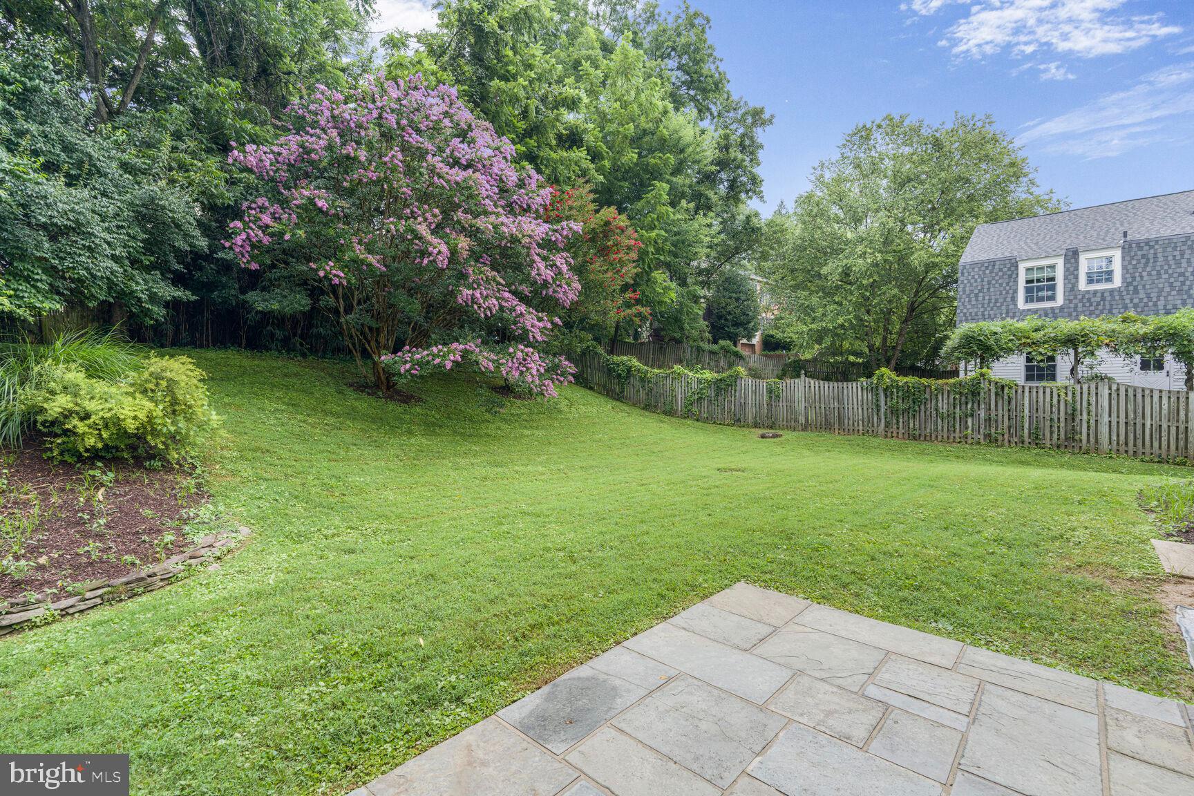 9102 Jones Mill Road Chevy Chase, MD 20815 - Photo 30 of 32 a view of a backyard with a garden