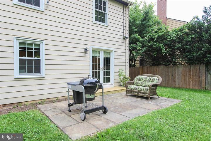 9102 Jones Mill Road Chevy Chase, MD 20815 - Photo 32 of 32 a house view with a seating space and garden