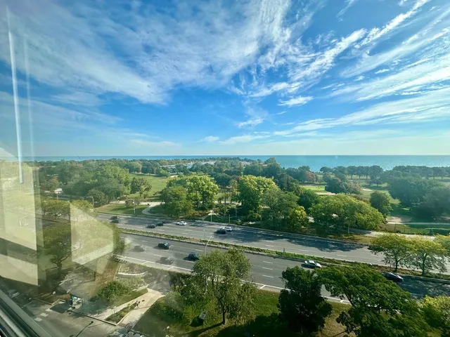 a view of lake with green space