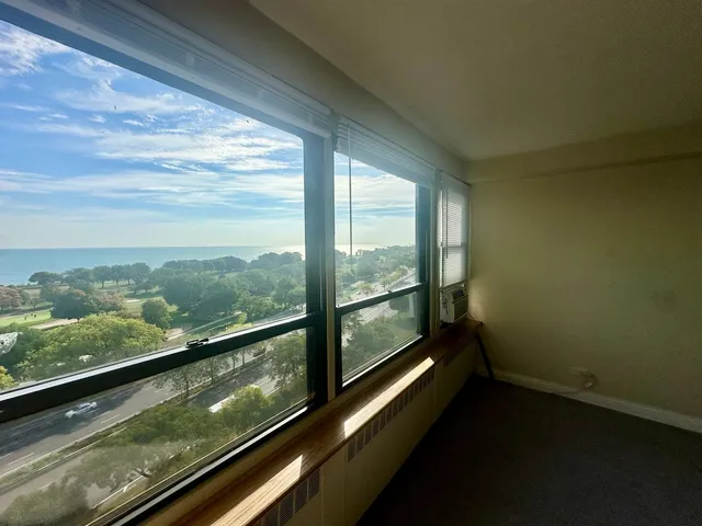 a view of a balcony with an outdoor space