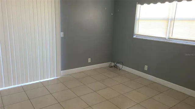 an empty room with a window