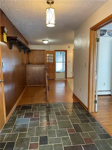 a bathroom with a mirror and a shower