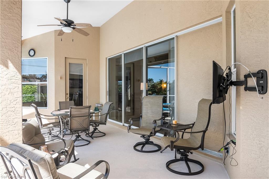 8931 Lely Island Circle Naples, FL 34113 - Photo 33 of 46 a living room with furniture and a window