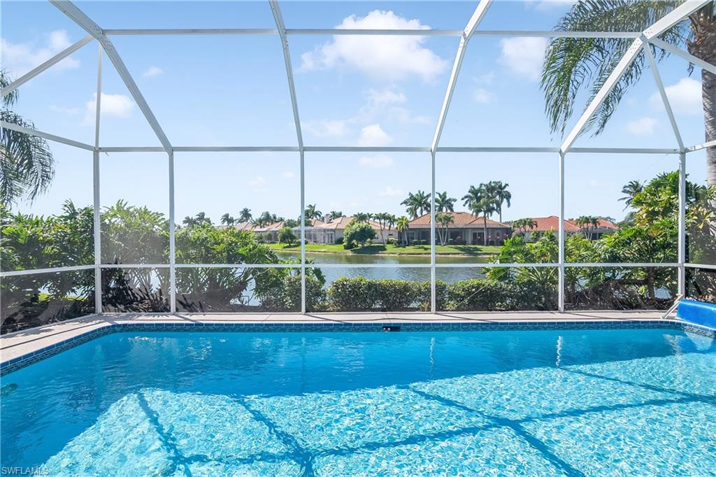 8931 Lely Island Circle Naples, FL 34113 - Photo 34 of 46 a view of a lake