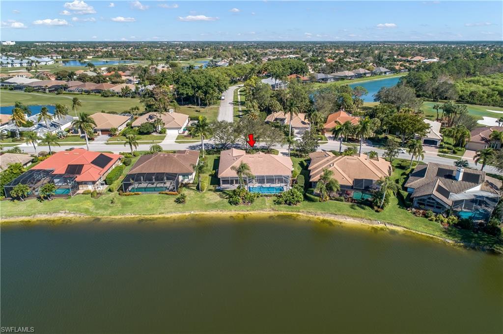8931 Lely Island Circle Naples, FL 34113 - Photo 4 of 46 a view of a city with lake