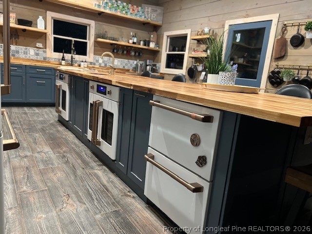 4119 Minnie Hall Road Autryville, NC 28318 - Photo 3 of 16 a kitchen with stainless steel appliances granite countertop a sink and a stove