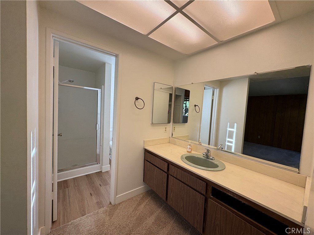 1941 Hillhaven Drive Brea, CA 92821 - Photo 17 of 30 a bathroom with a sink and a mirror