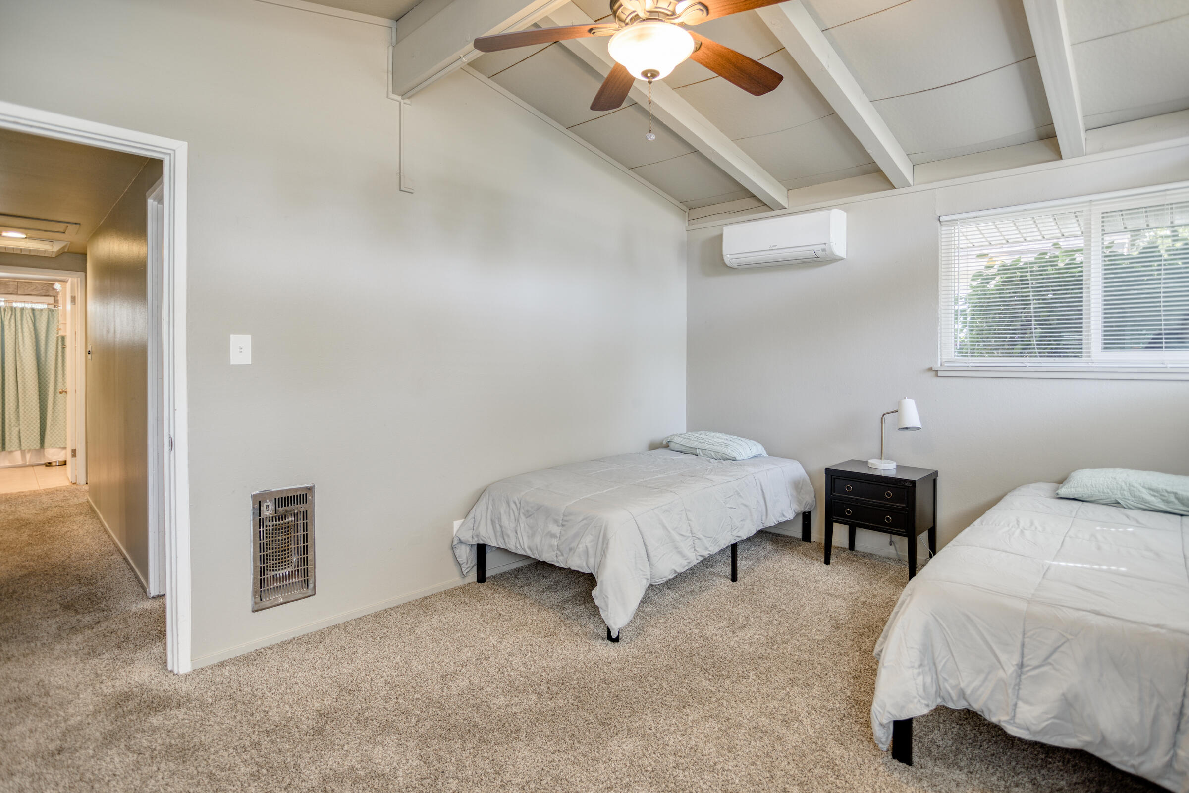 760 Locust Street Redding, CA 96001 - Photo 4 of 12 a bedroom with a bed and a window