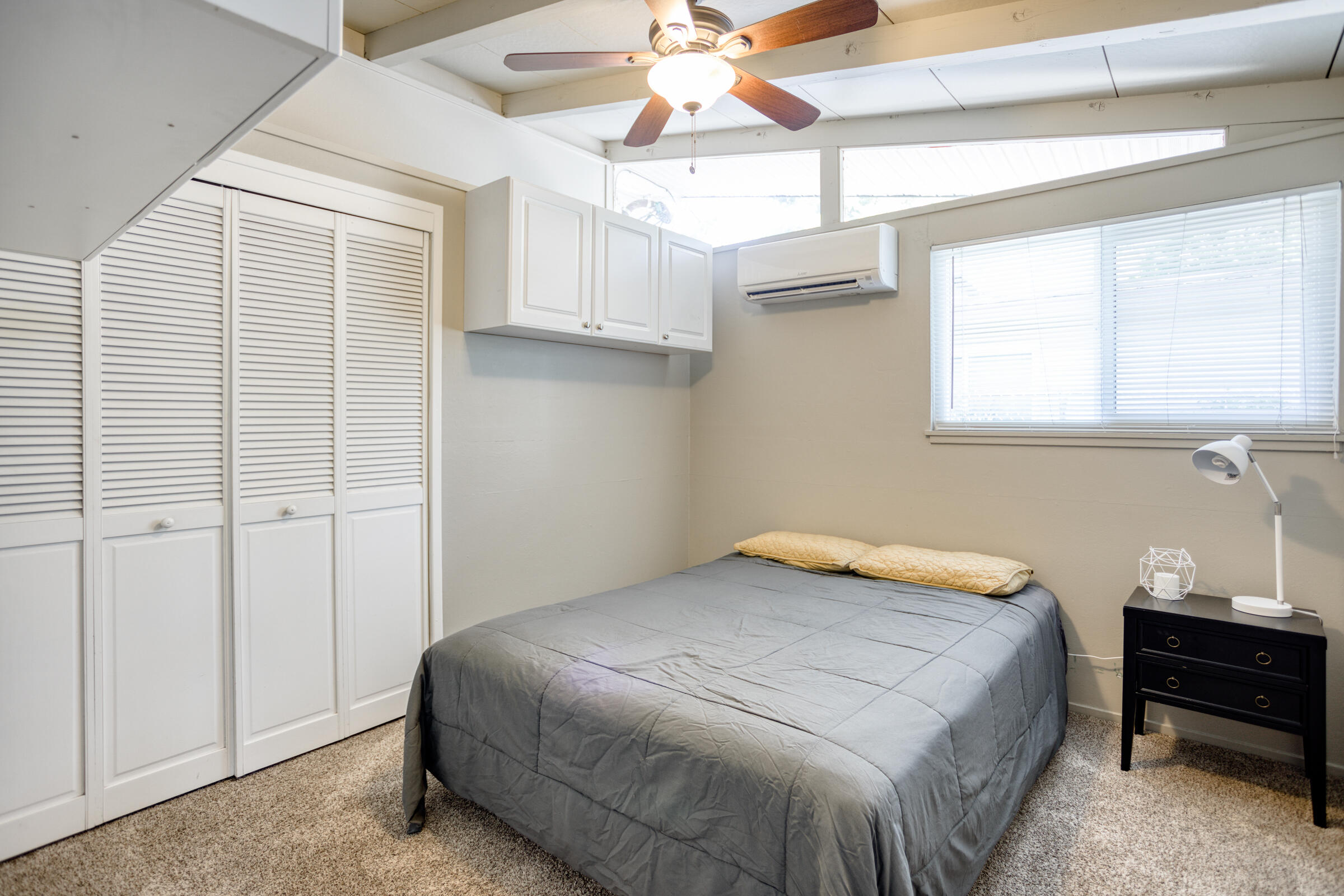 760 Locust Street Redding, CA 96001 - Photo 5 of 12 a bedroom with a bed and a window