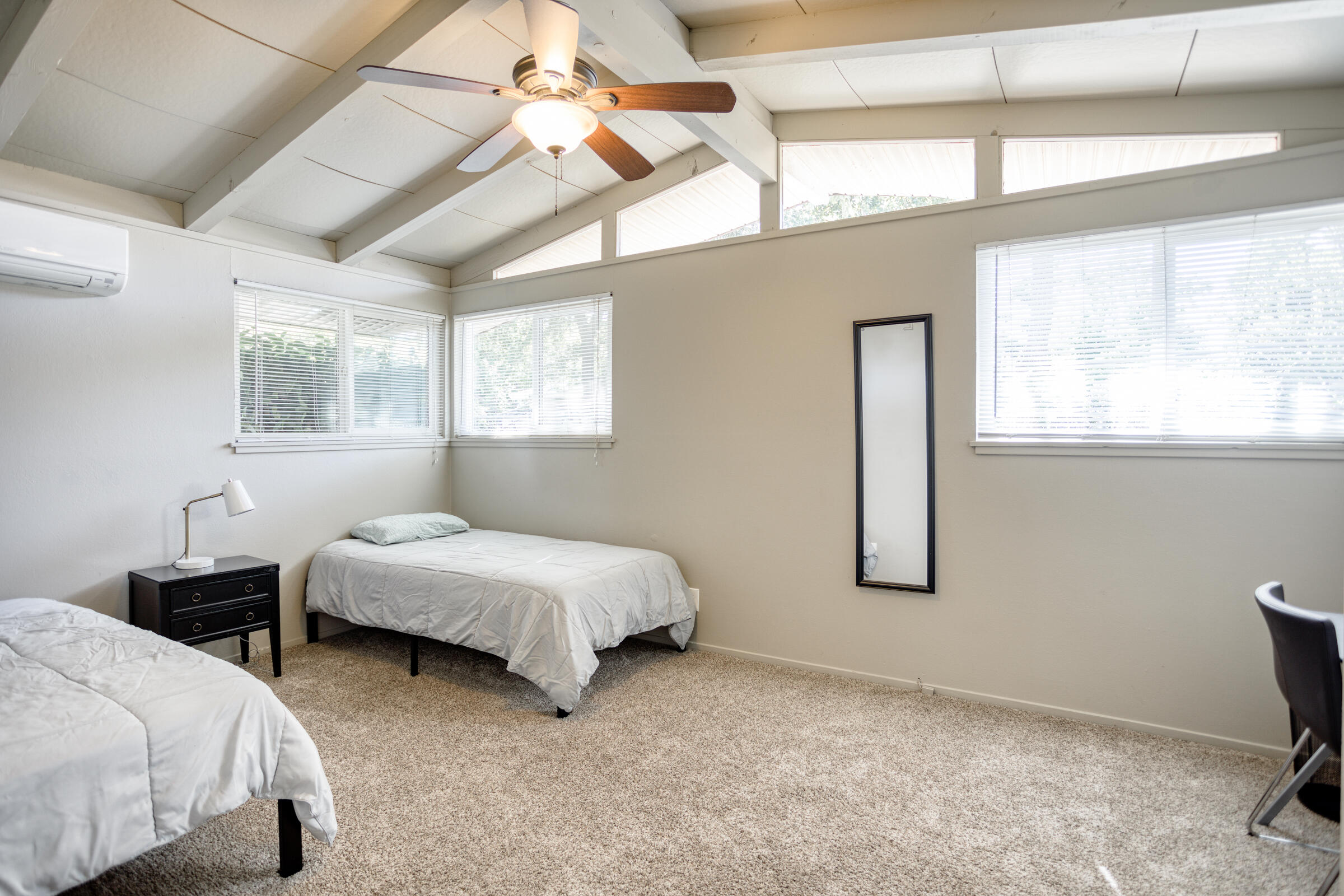 760 Locust Street Redding, CA 96001 - Photo 6 of 12 a bedroom with two beds and a window